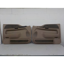 1999-2007 Ford F-250/350 Super-duty Door Panels;used, clean, tan-driver power switch